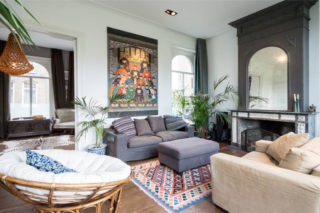 Spacious very light and comfortable living room with fire place