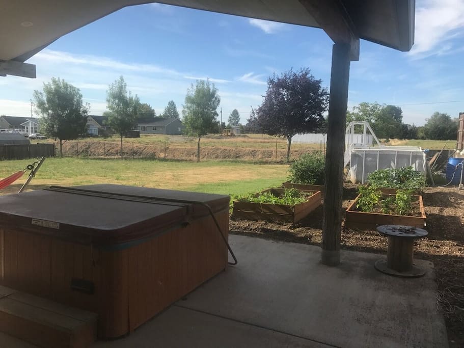 Hot tub and garden - many veggies to choose from.