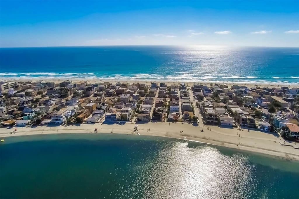 Located on the Mission Beach strand - six homes from the beach and 6 from the bay