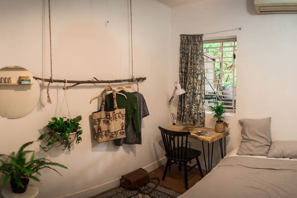 Lovely bedroom with full of cute and stylish stuffs and furniture - a corner where you enjoy your stay at the fullest as a local. Wide window right down to main street of Hang Giay