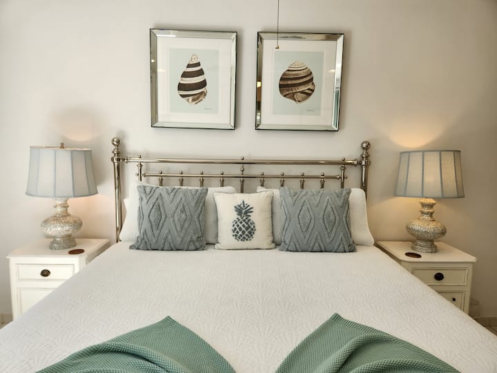 Primary bedroom with king sized bed.