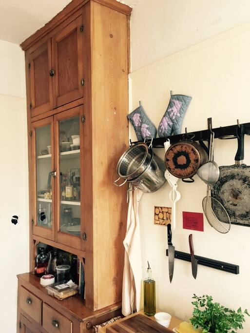 Well stocked kitchen with beautiful built-in cabinetry. Pots, pans, etc. as well as kitchen basics like salt and olive oil are provided.