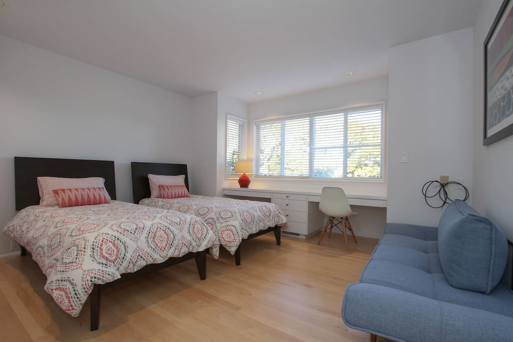 Bedroom with two twin beds and sleeper sofa for 1