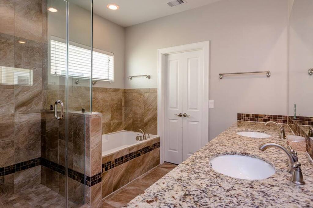 Steam Room Spa and Jacuzzi tub, the door pictured is the walk in closet