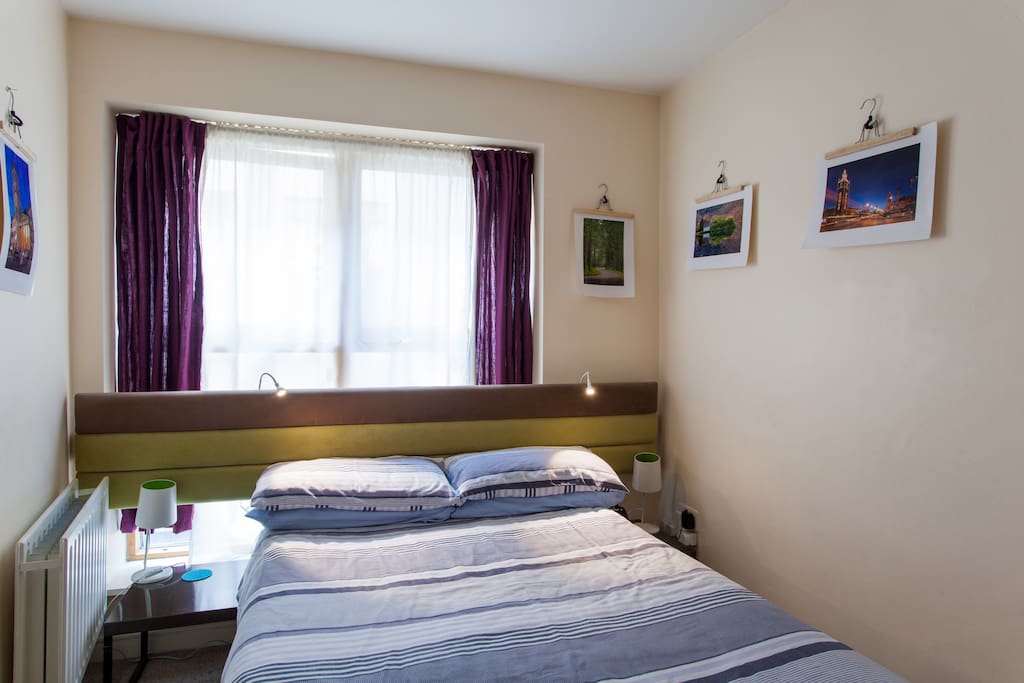 Photographs from my journeys around the world feature in this bright and airy double room