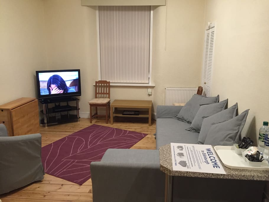 The Living Room has lots of comfortable seating and cable tv.