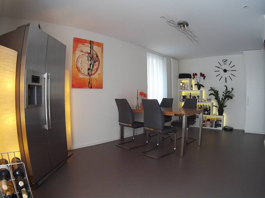 Spacious kitchen with a huge fridge with and ice-maker