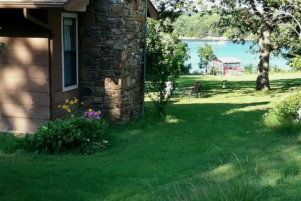 View of gently sloping yard from the south side of the house