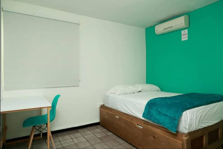 Comfortable and spacious bed.