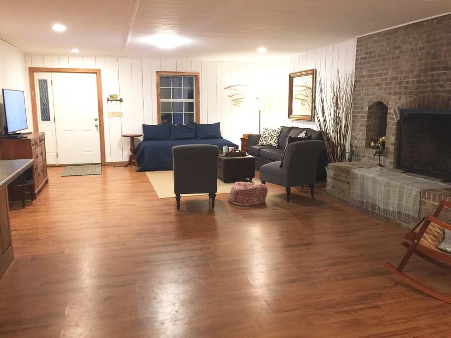 Huge open living, dining, and Kitchen combo Room has 1 single ( extra long ) Can serve as sofa or extra bed. New 50" Flatscreen Smart TV with Cable and DVD player.