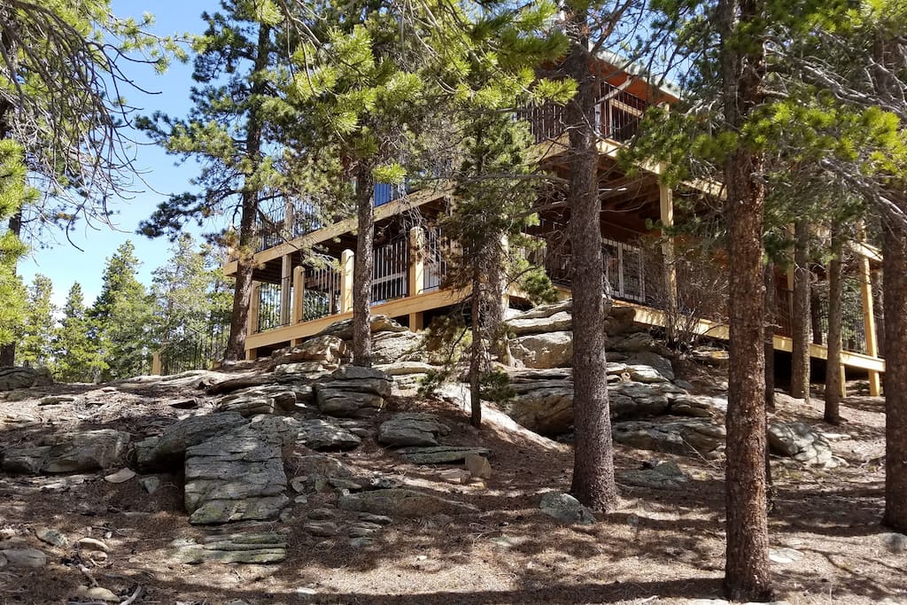 Mountain home with two story wrap-around deck.