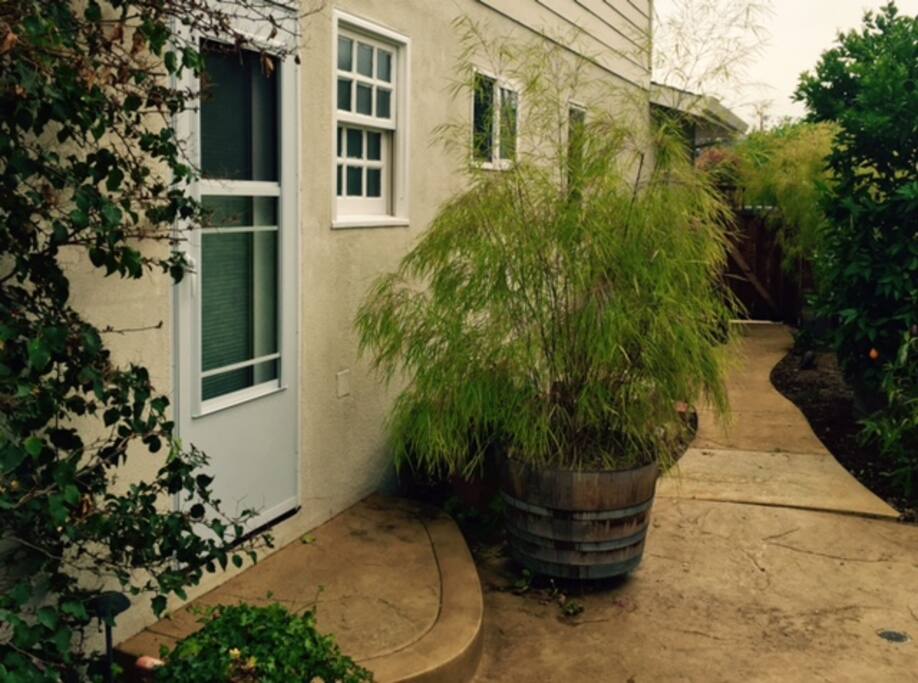 View of the private entrance path from the street.