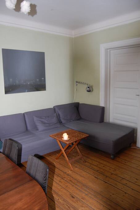 The sofa in the living room - A part of the sofa can be turned into a regular bed.