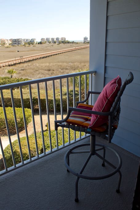 Balcony overlooking the natural wetlands, beach boardwalk and beach.