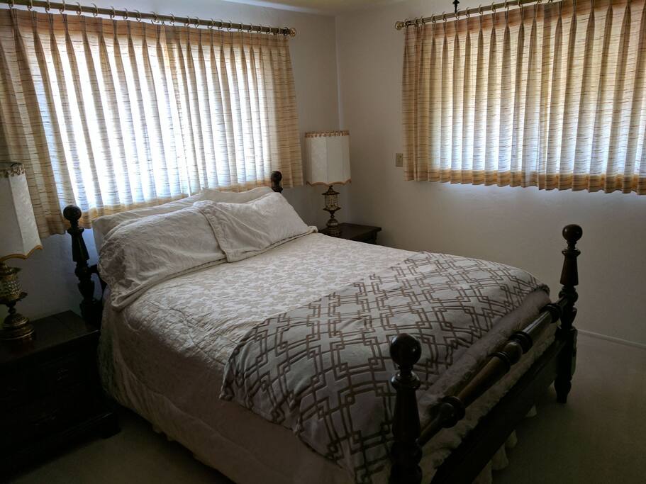 king size bed with bathroom attached
