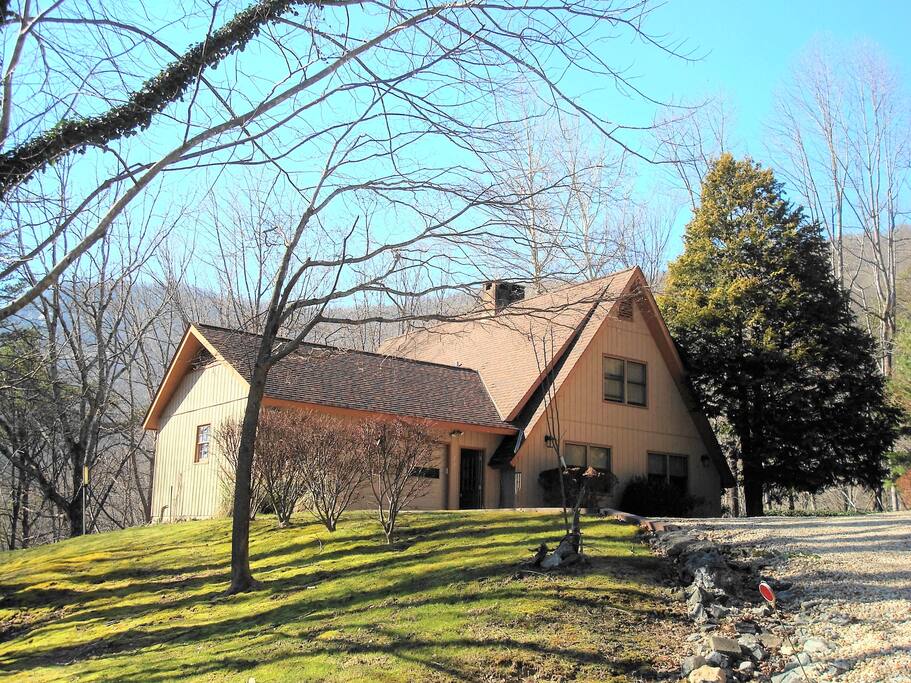 Front of the house from the road. Two-car garage.