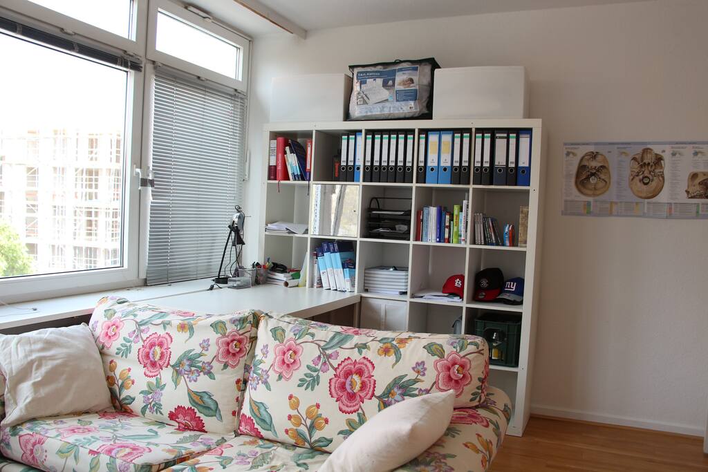A Pretty Couch And A Desk For Your Private Time