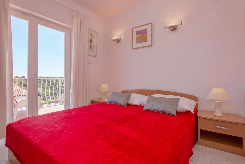 Double bedroom with doors to terrace