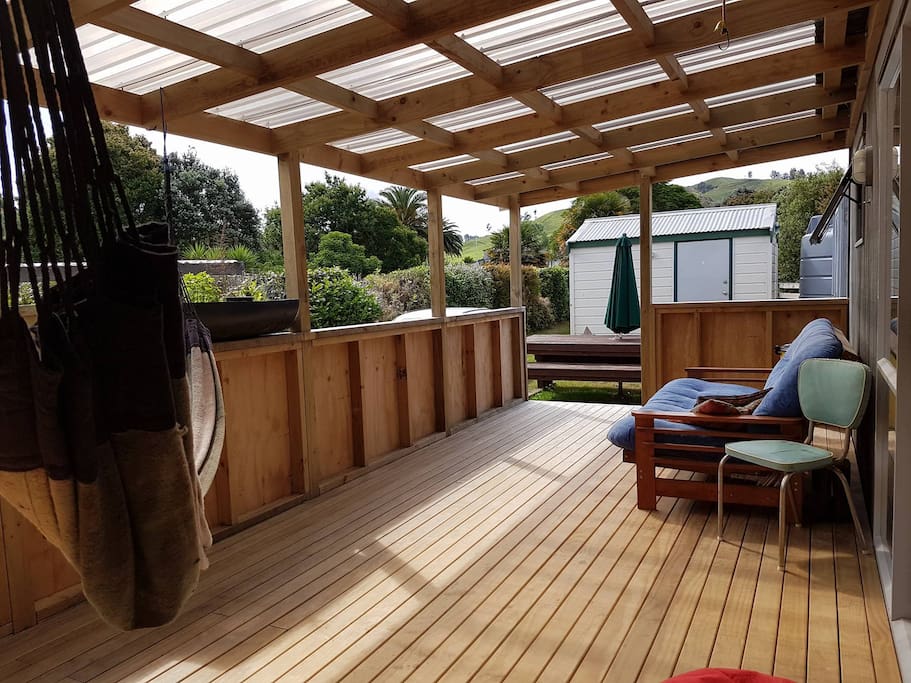 Covered deck with fold out sofa and hammock
