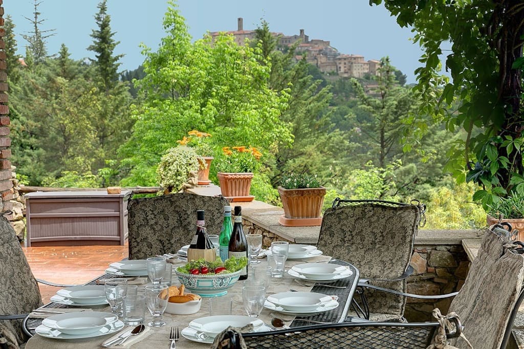 Lunch on the terrace with view of village behind it