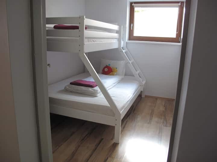 Second bedroom sleeps 2 adults or 2-3 children.