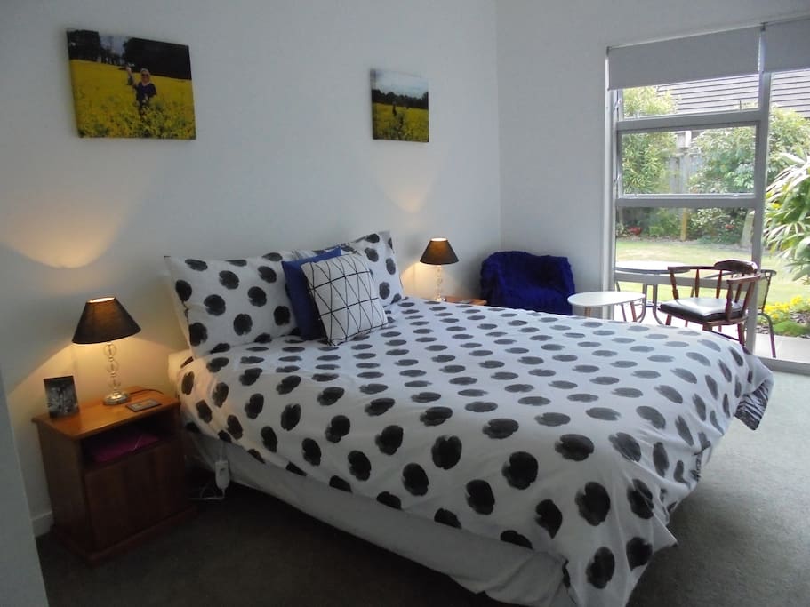 Queen sized bed with private deck
