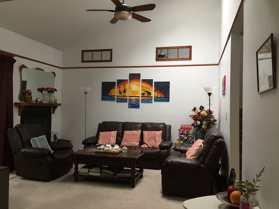 Cozy and artistic atmosphere living room. Wood fireplace , TV . We are pleased to share this space with you . However, we will certainly respect your personal preferences, such as chat with us or not, it's fully depend you .