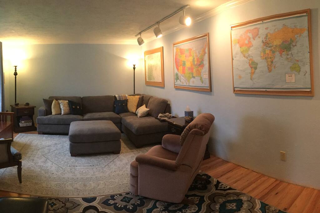 Living room -- ottoman pushes against couch to make a bed