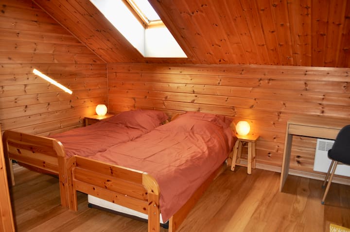 Bedroom 2 with two single beds, pull out bed, sofa bed and desk.