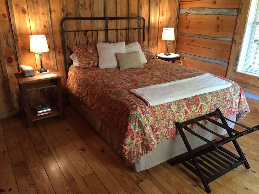 Queen bed, dresser, closet in the private master bedroom