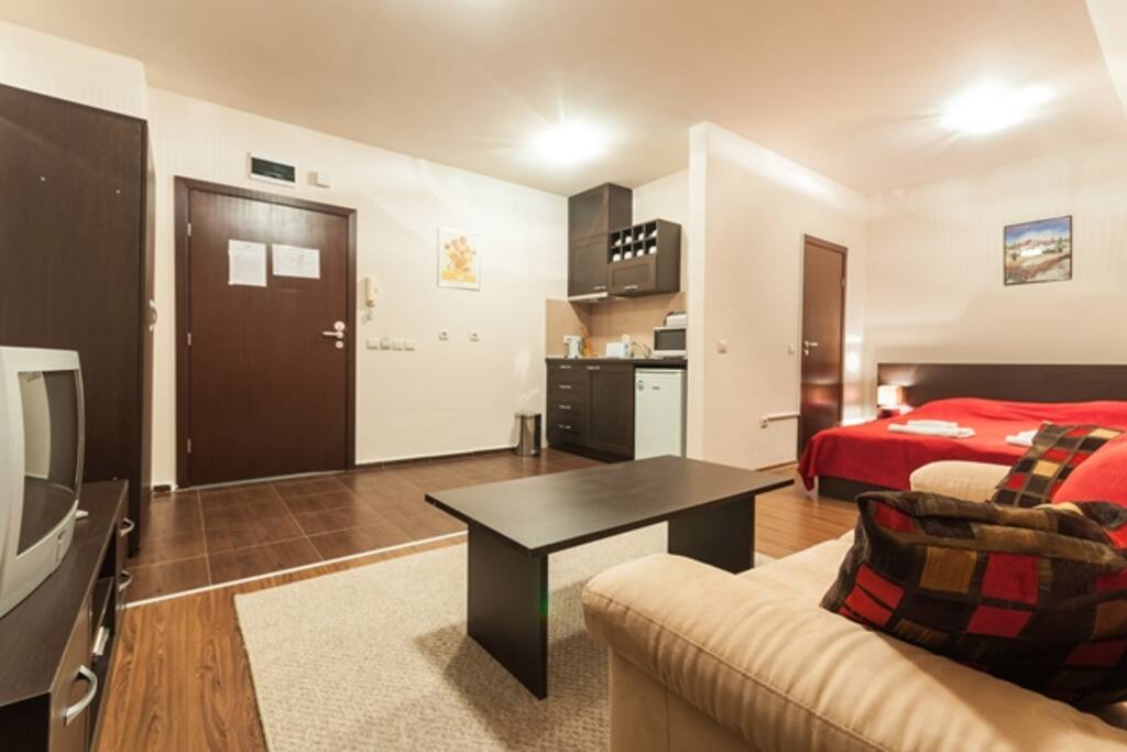 Lounge with TV And Sofa Bed Double Table.