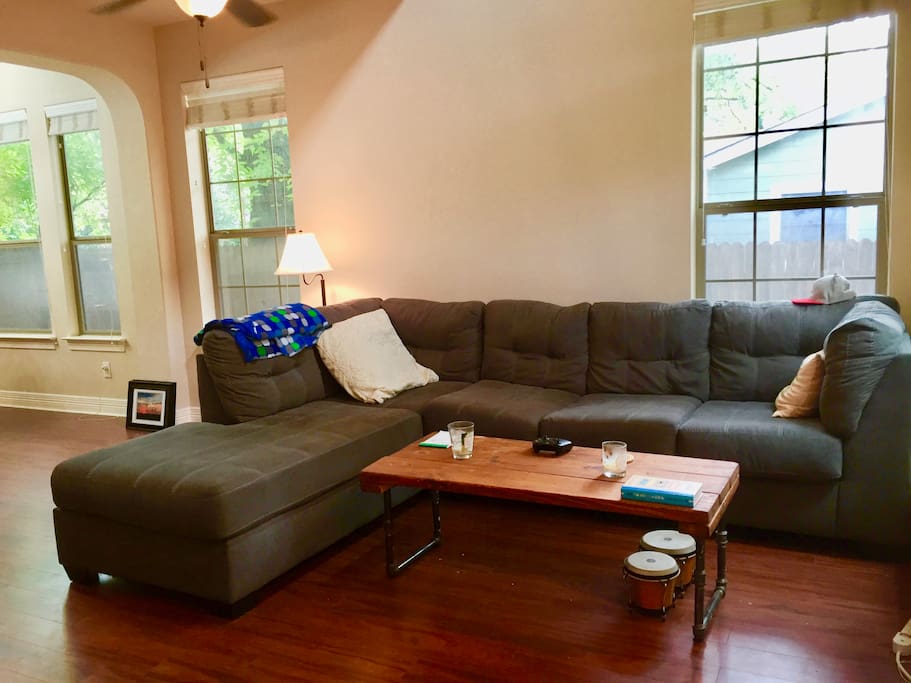 Living Room (Couch faces the Flatscreen TV and Fireplace). Locally handmade industrial coffee table