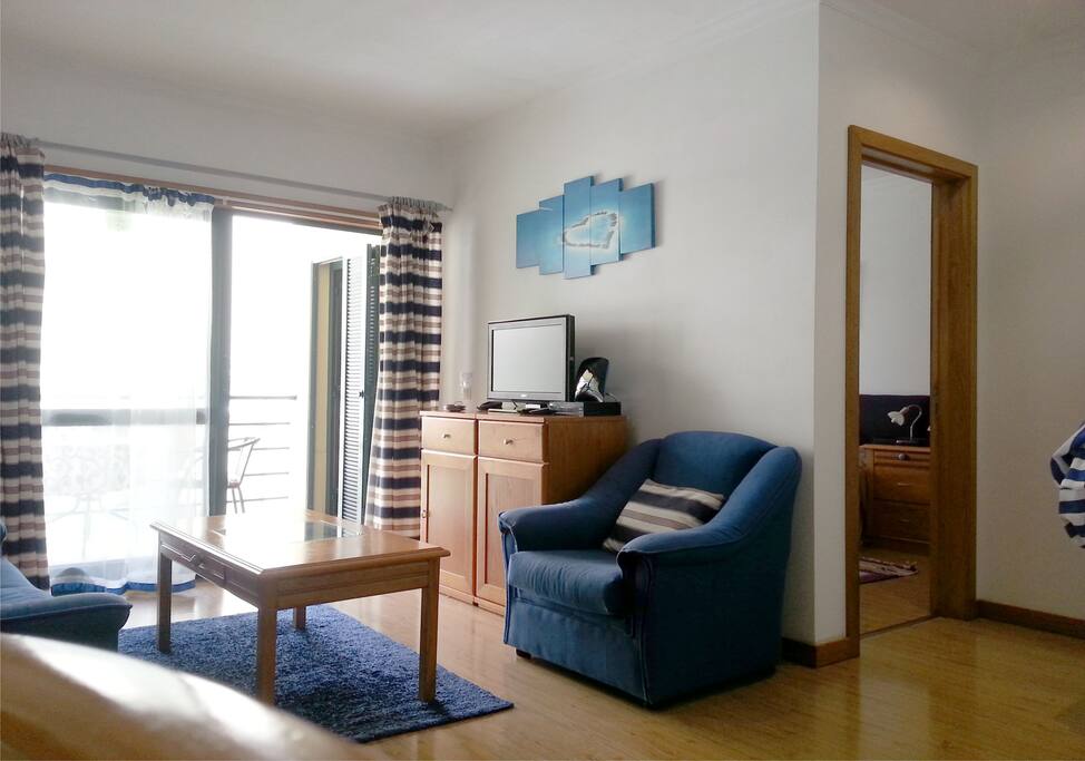 Living room leading onto balcony.