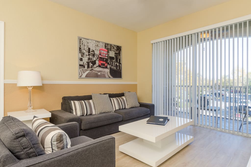 Updated Luxury Living Room with Beautiful Hard Wood Floors