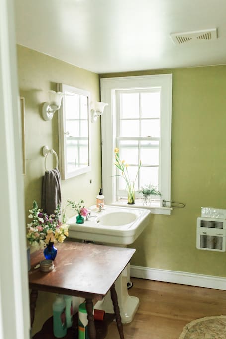 Guest bathroom, which also includes a clawfoot bathtub and shower. This bathroom is only shared when there are guests in our other Airbnb room. Jeff & Michele Fine Art Wedding Photographers