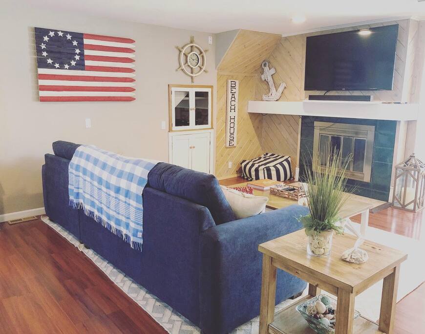 Spacious living room with 60" TV