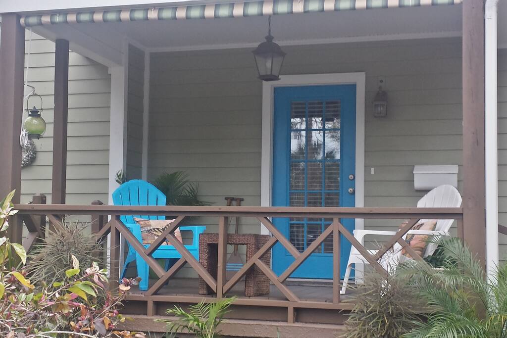Enjoy a drink and snack on the front porch as you talk with the neighbours walking their dogs.