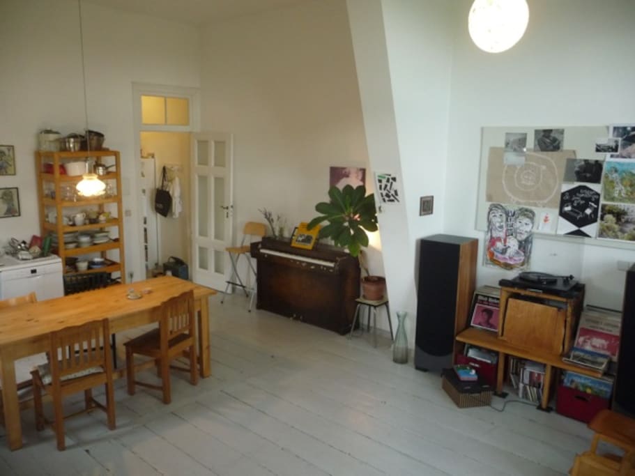 Piano and sound system in the living room/kitchen