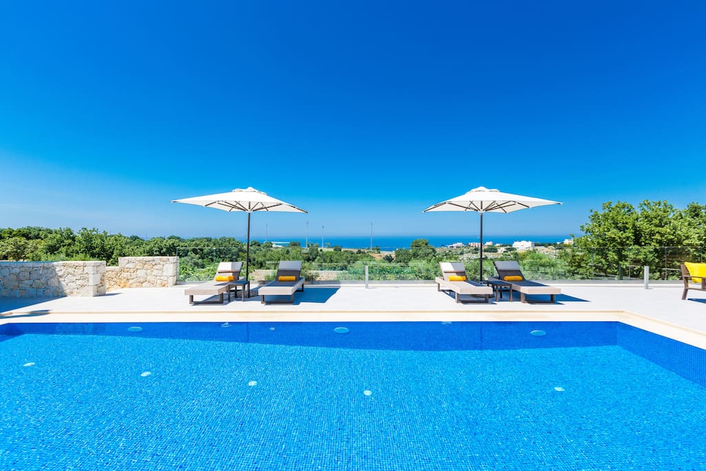 Swimming pool area with panoramic sea view