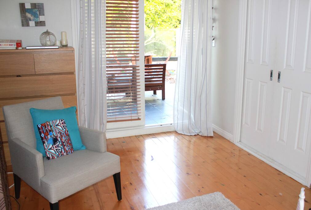 Huge, sunny bedroom leading out onto rooftop terrace