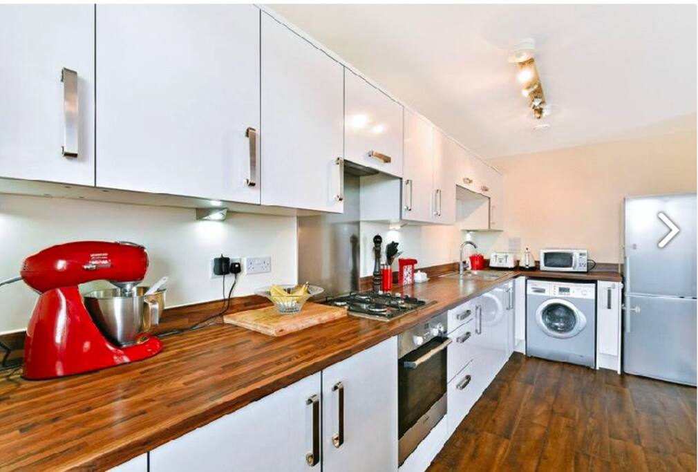 A well equipped kitchen with a coffee machine!