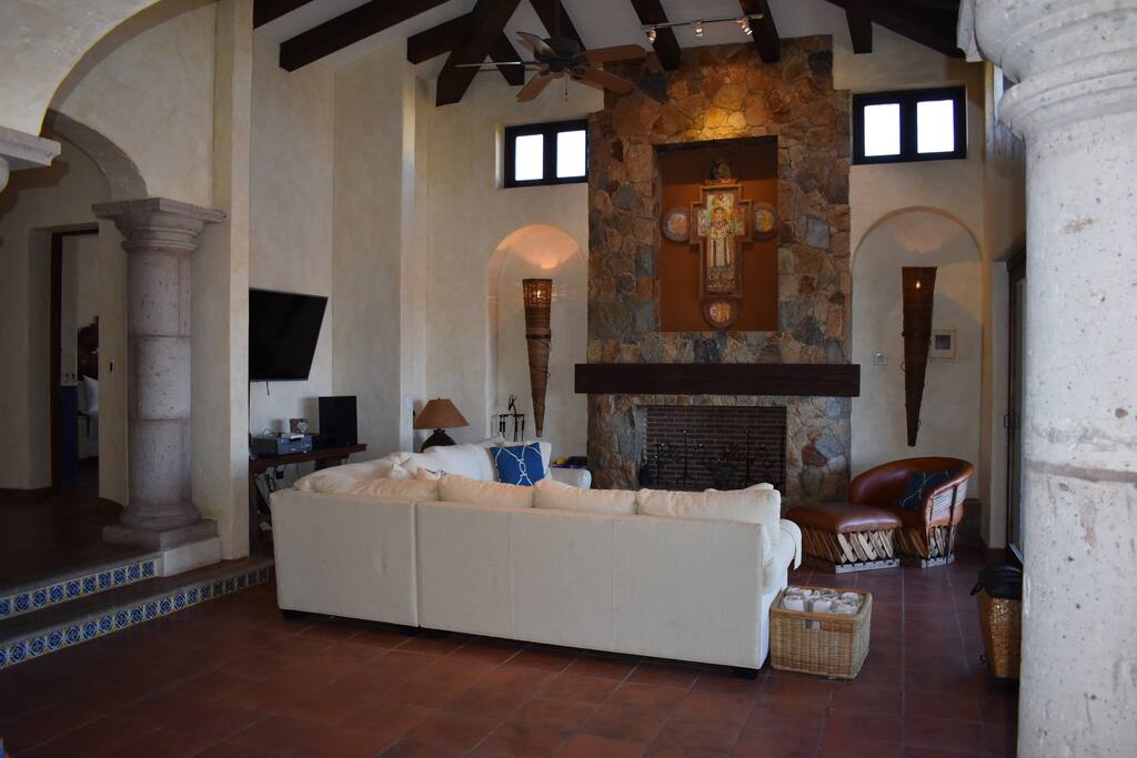 Living Room - opens to beautiful pool area