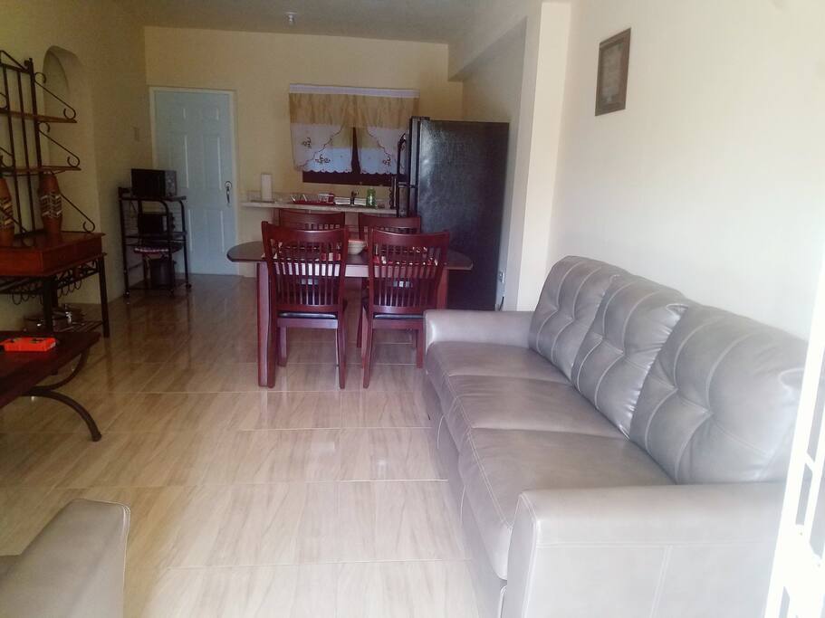 Living area, which is open to the dining and kitchen.