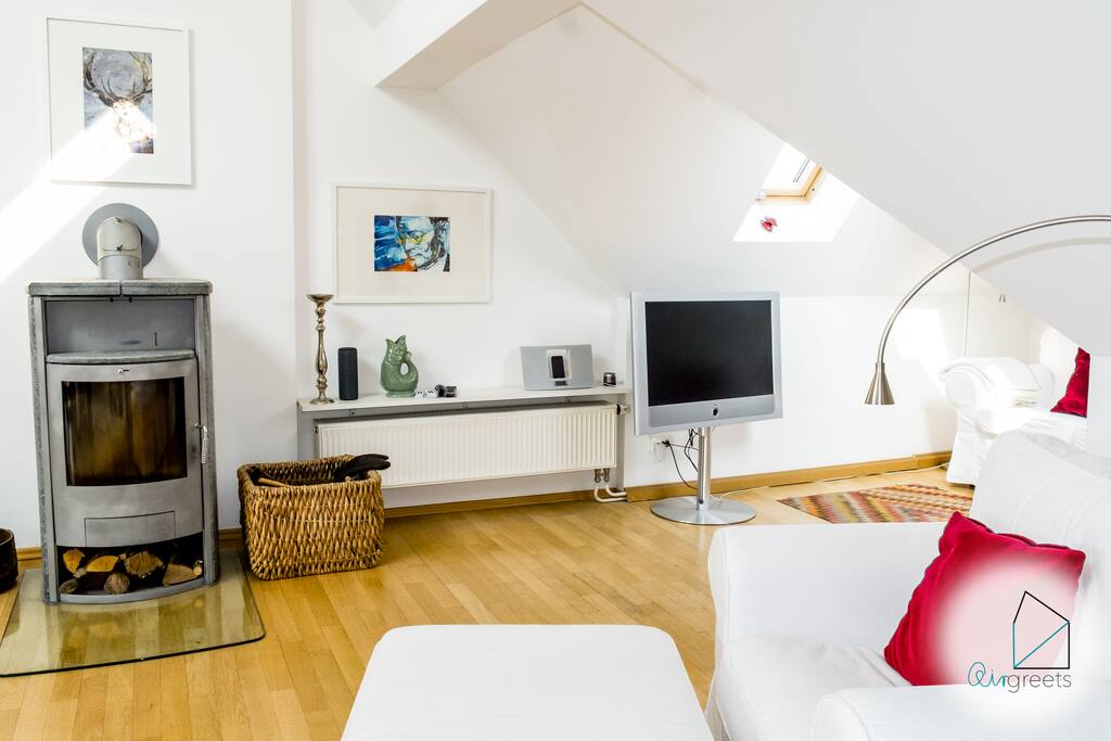 The fireplace creates a feeling of unity and warmth.