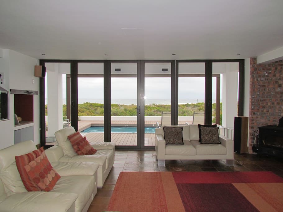 Large patio doors allow nearly uninterrupted view over the nature reserve and Atlantic ocean