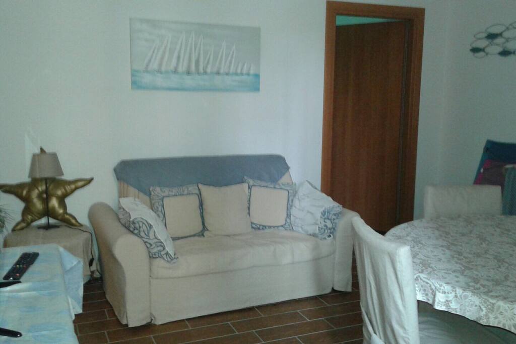 Zona giorno con divano letto materasso 1 piazza e mezzo