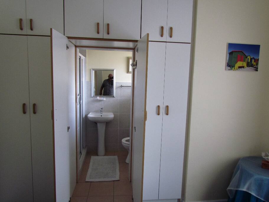 Leading into private bathroom. from bedroom.