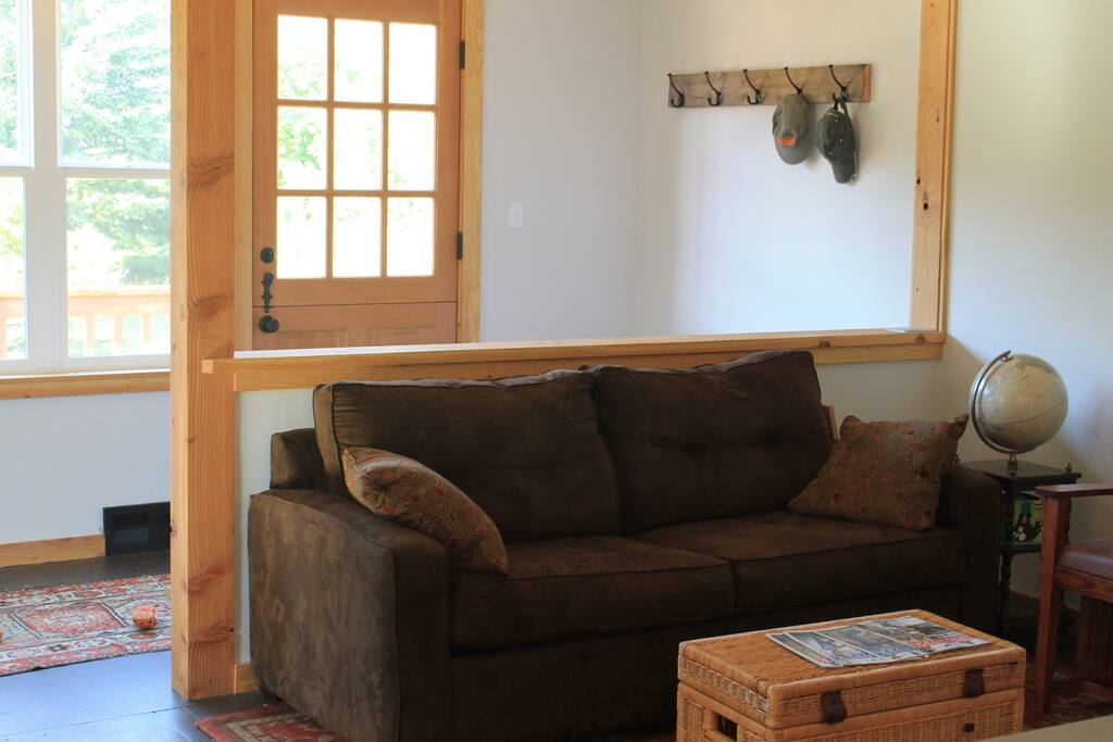 The front entry brings you right into the open living room/ dining room space.
