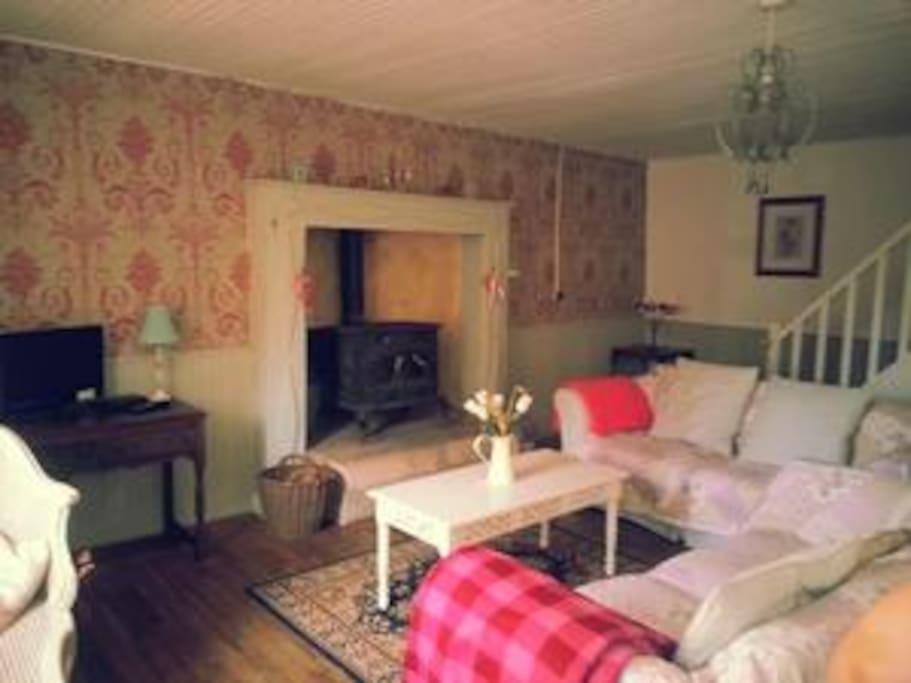 comfy lounge with woodburner