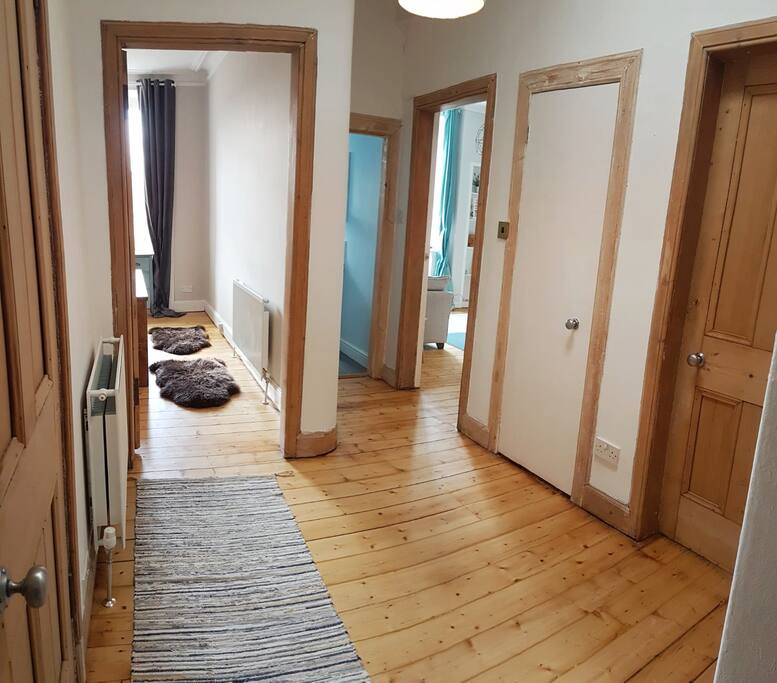 Original natural wood flooring throughout